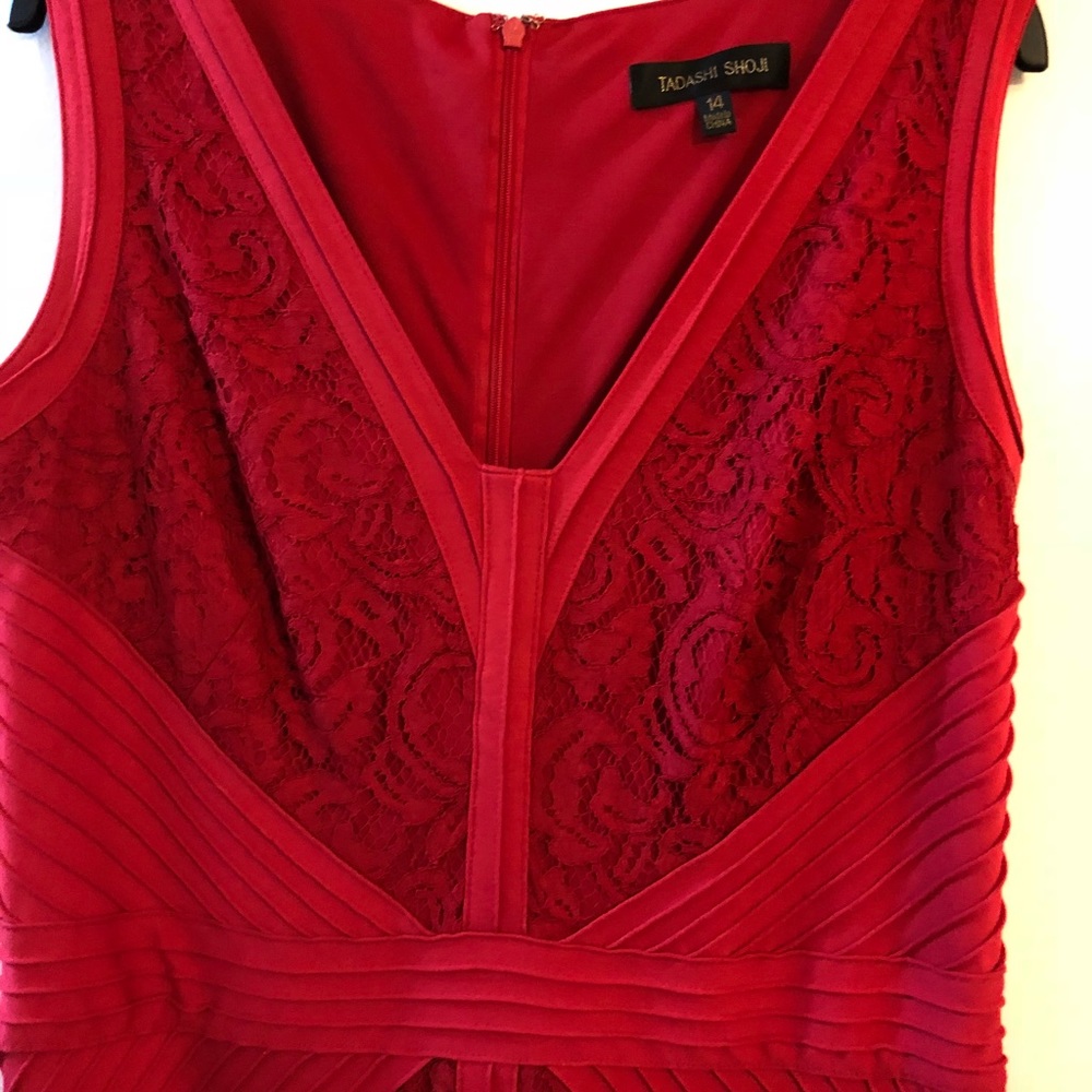 Lady in red dress with lace.